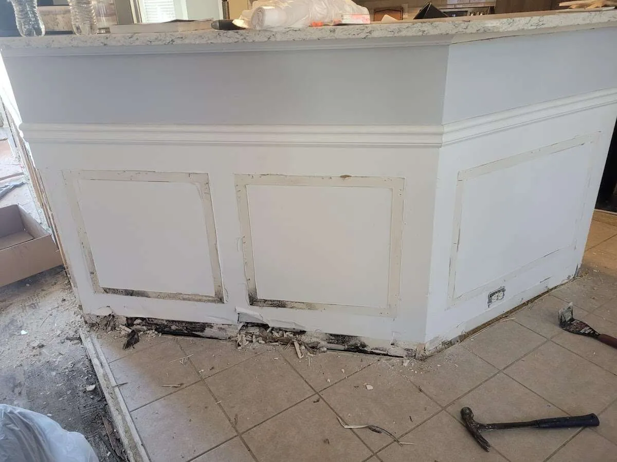 Water damage and mold on kitchen during Storm Damage Restoration in Two Rivers